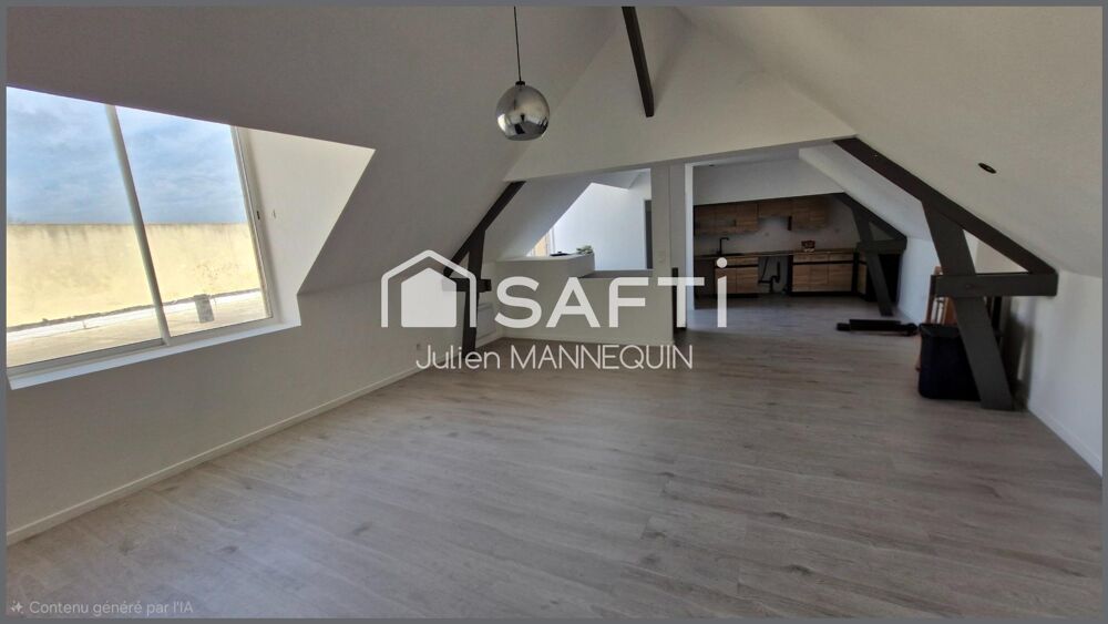 maison mitoyenne de 100 m2 , 2 chambres dont une suite parentale avec sa douche, cuisine ouverte sur le salon et accès a une ter