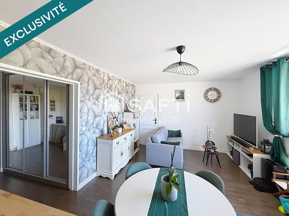Appartement 65m² balcon, cave, et place de parking boxée