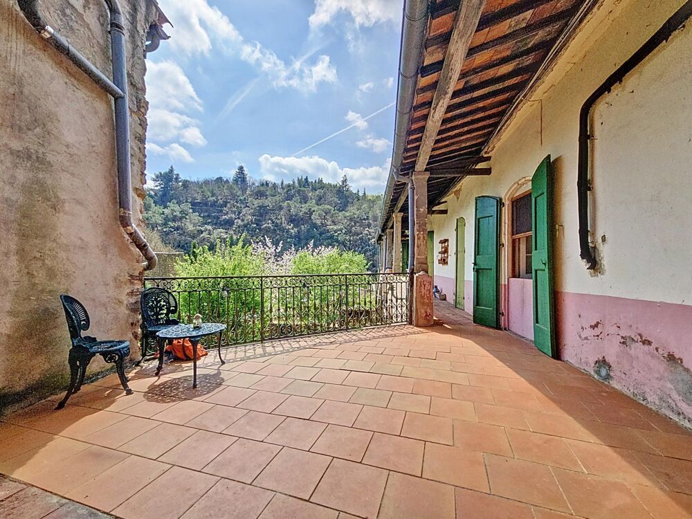 Appartement T3 de 77 m² avec caves voûtées et jardin collectif  Graissessac