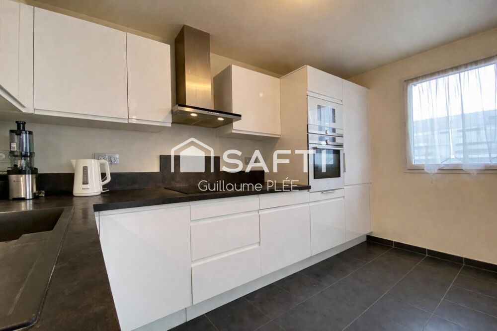 Appartement 3 pièces avec un balcon et une place de parking