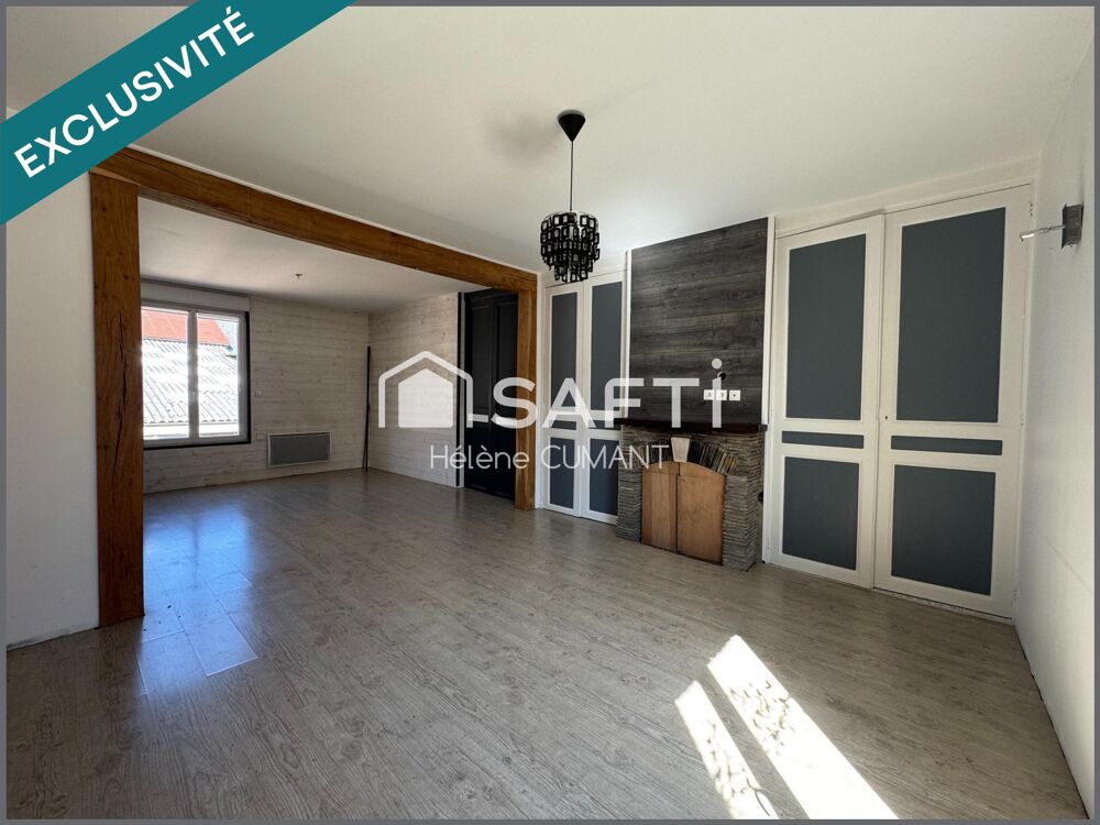 Duplex avec grand garage en plein coeur de Lisieux, au calme absolu à deux pas des commerces.
