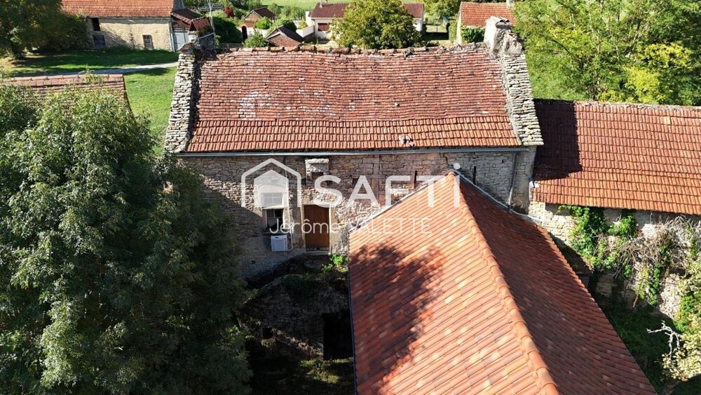 Vente Maison Charmante maison en pierre de 55m² avec grange attenante de 48m² et cave de 50m² offrant un beau potentiel d'aménagement Vailhourles
