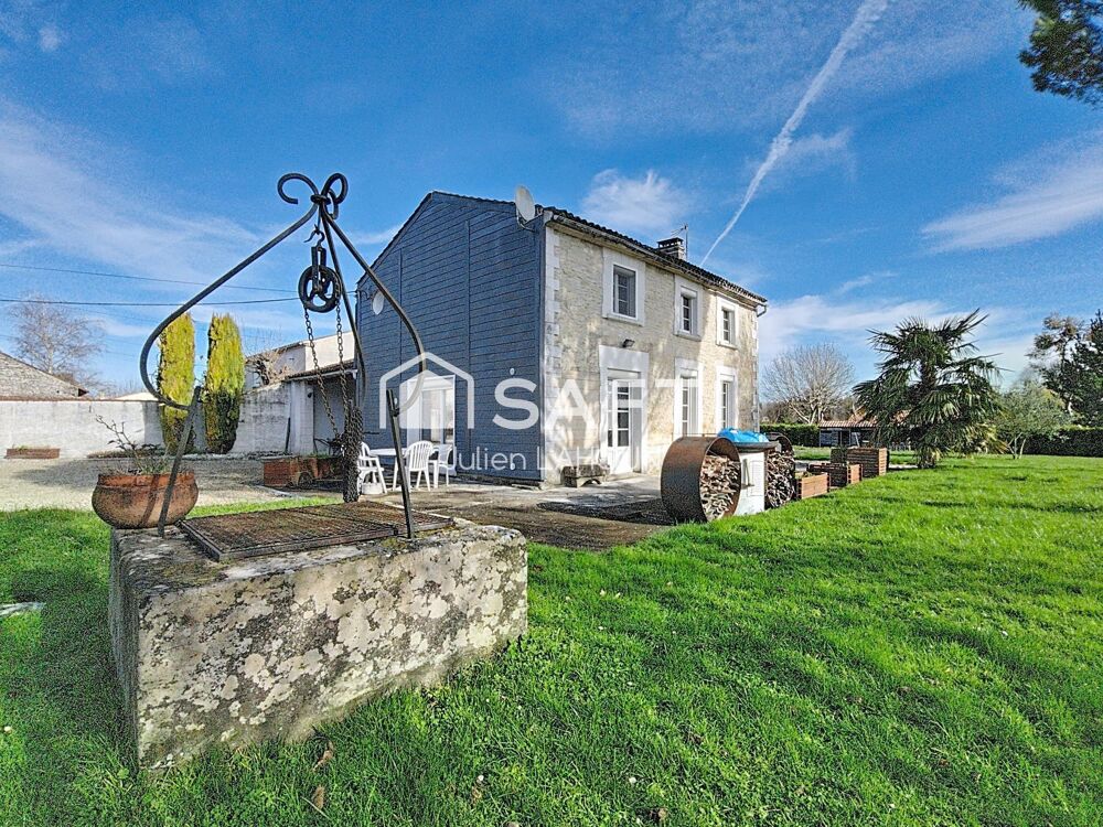 Maison en pierre avec piscine et garage