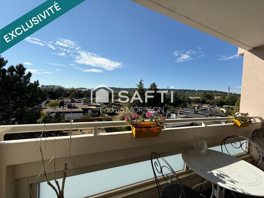 Appartement 65m² balcon, cave, et place de parking boxée