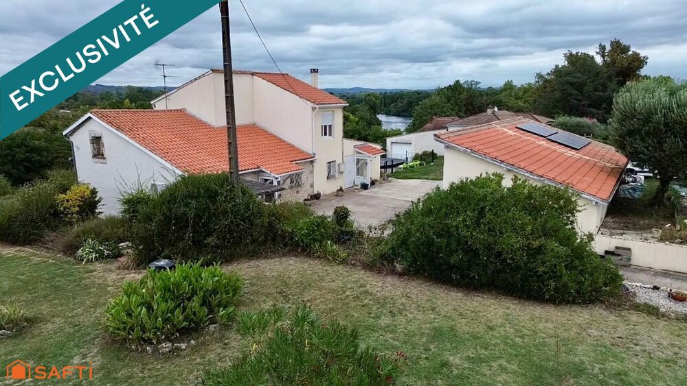 Maison familiale avec dépendances, vaste terrain et vue dégagée sur le Lot