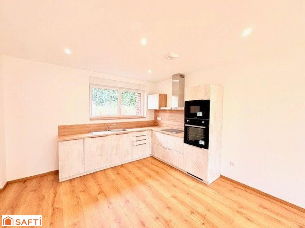 Location Saultain / BIEN DEXCEPTION  MAISON SEMI - INDIVIDUELLE DE PLAIN-PIED AU COEUR DUN JARDIN PAYSAGER