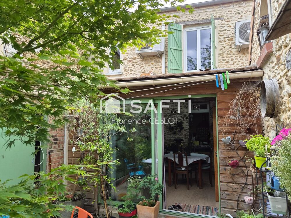 MAISON DE VILLE AVEC JARDIN