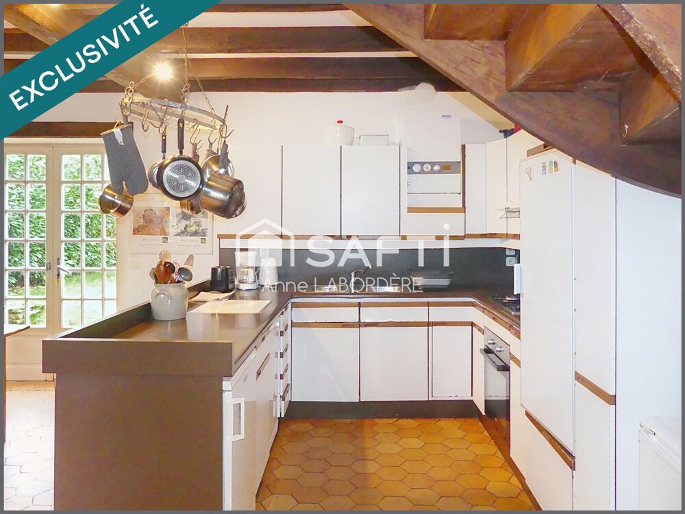 Elégante maison familiale aux volumes généreux.