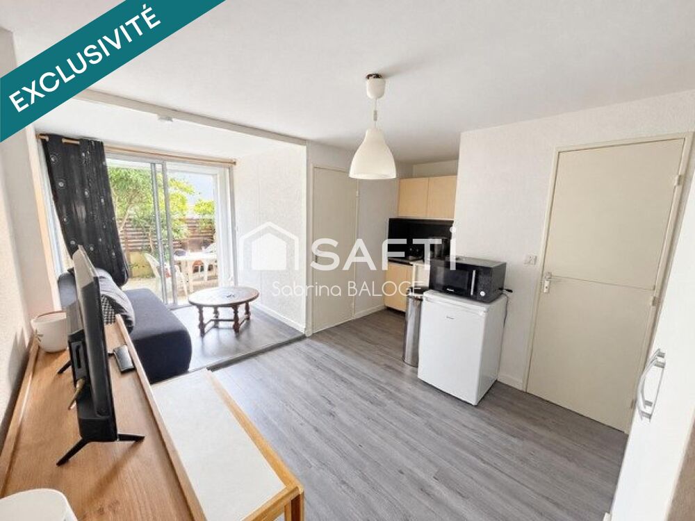 Appartement en rez-de-jardin avec belle terrasse