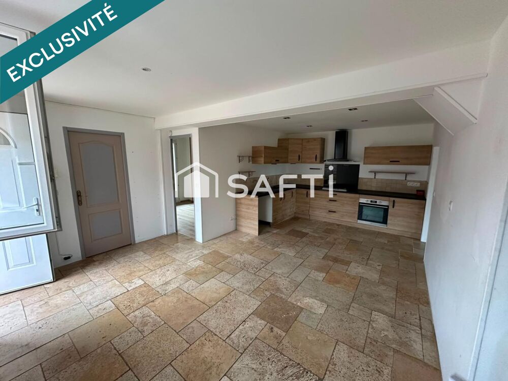 Belle propriété verdoyante, au coeur de la ville avec 3 logements indépendants
