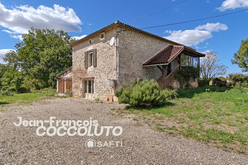 Vente Maison Maison ancienne en pierre de 65 m² avec deux chambres, garage, cave et jardin arboré Porte du quercy