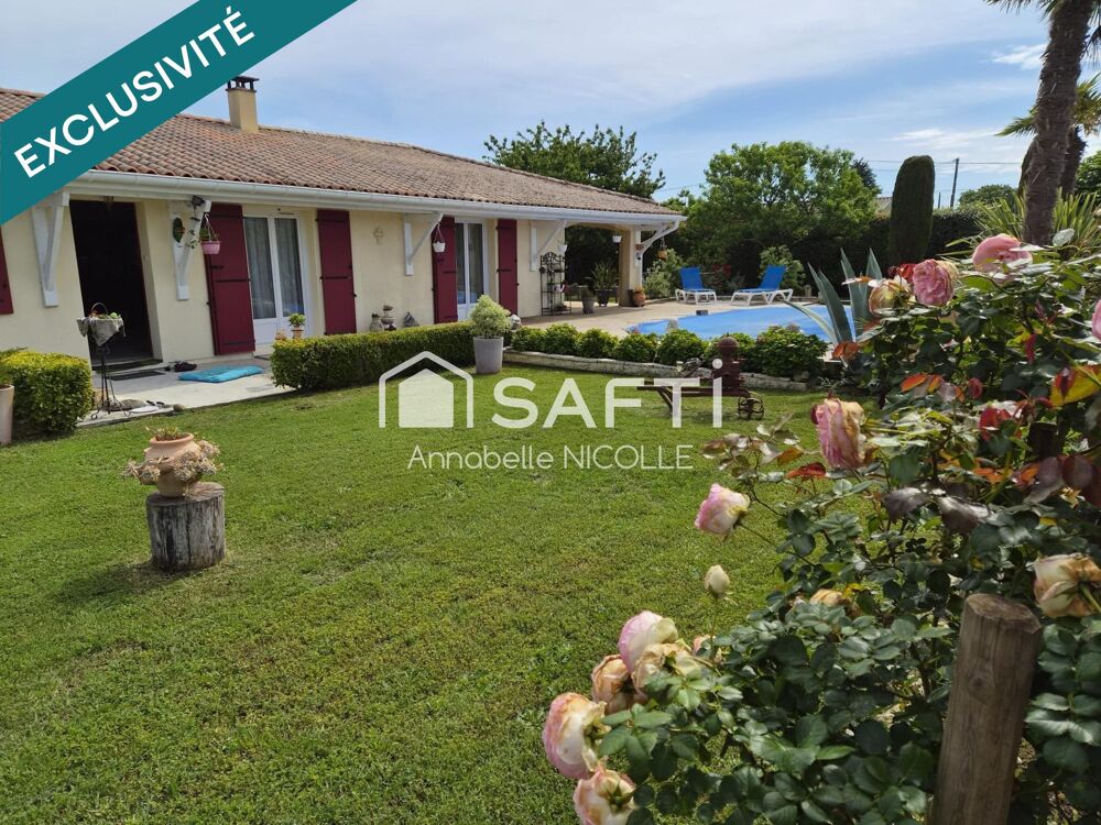 Maison familiale de plain-pied avec piscine et double garage, sur terrain arboré de plus de 1900 m2 à Couquèques (33340)
