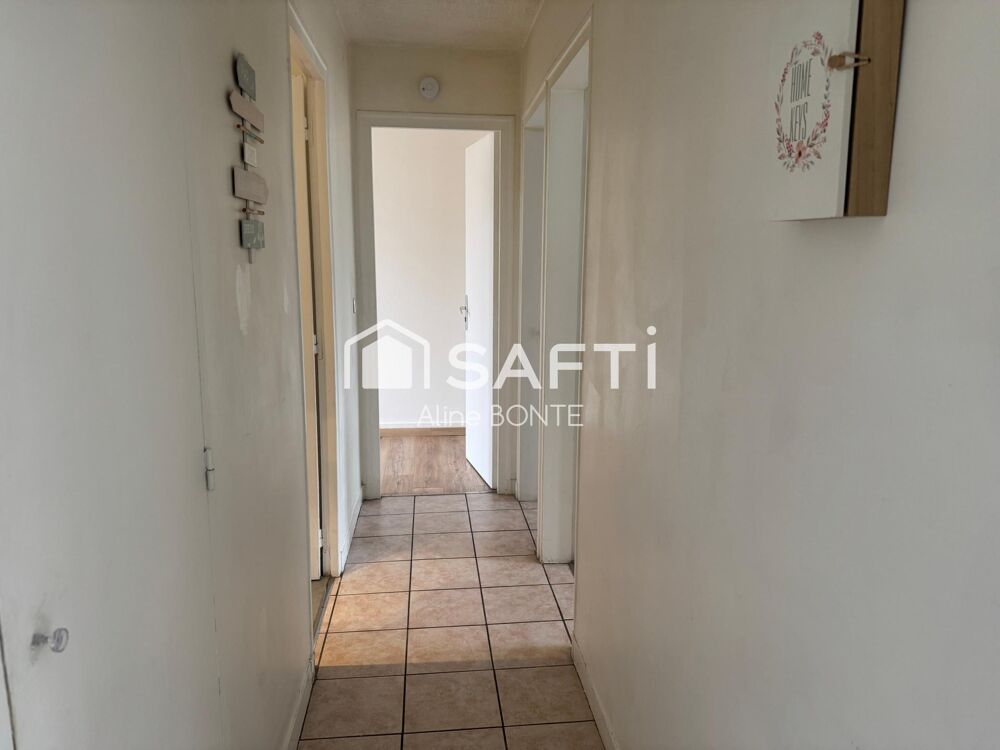 Appartement F4 avec place de parking et cave