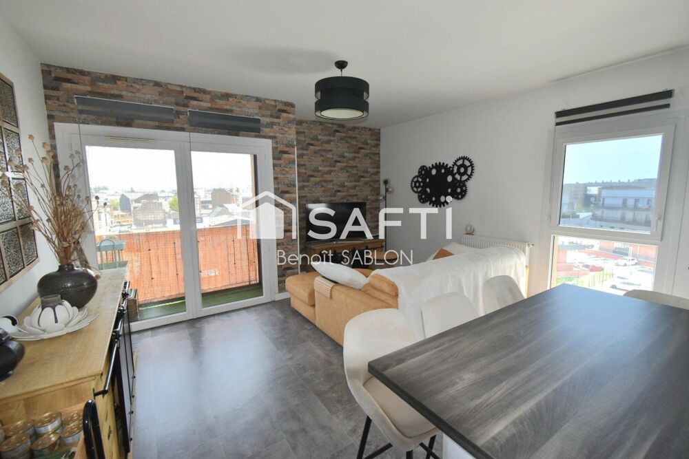 Appartement récent 54m², balcon, stationnement