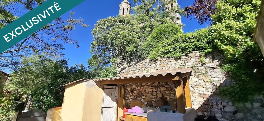 Maison de Maison de village avec terrasse et cuisine d'été, idéalement située au coeur du centre ancien. À découvrir!