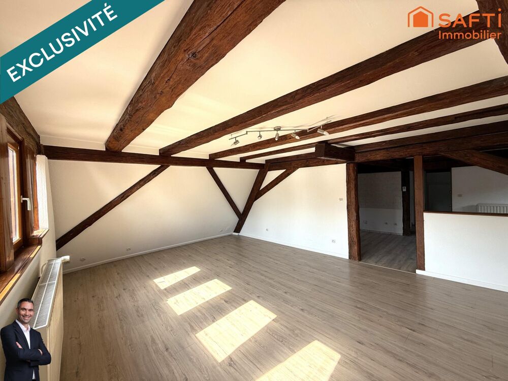 Superbe appartement de 4 pièces disposant d'une cave et d'une place de stationnement couverte !