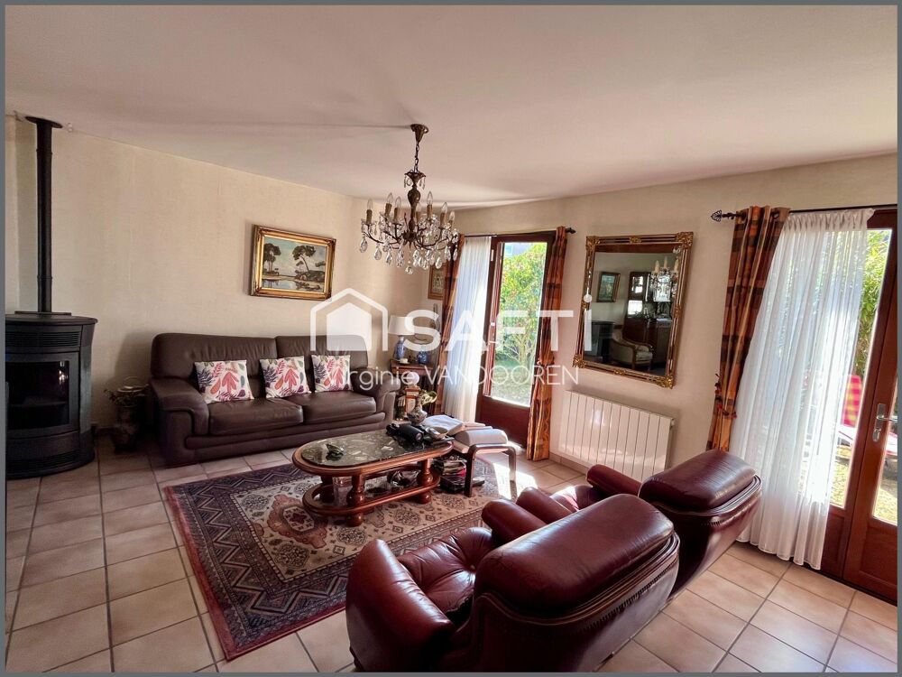 Maison individuelle 4 chambres, jardin arboré et grand sous-sol