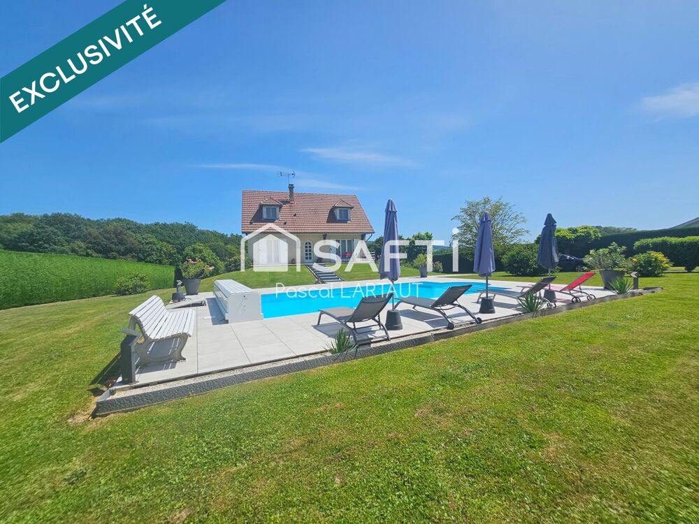 Maison familiale au calme avec grand terrain et piscine