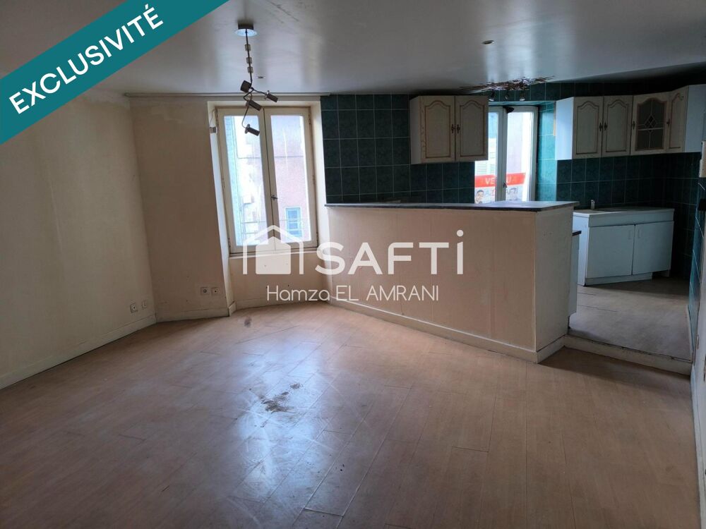 Immeuble de rapport en centre ville 2 appartements et un commerce
