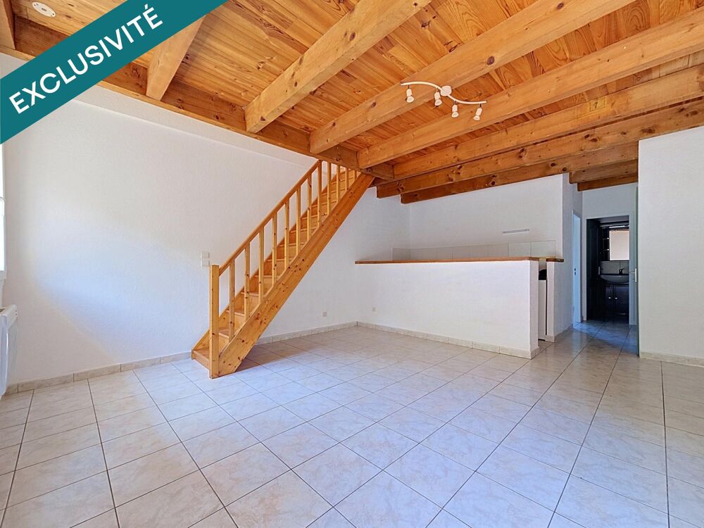 Un lumineux duplex T4 avec terrasse, jardin et stationnement privatif, idéalement situé à Bédarieux.