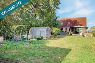 Vente Maison Joli pavillon de brique, aux beaux espaces de vie, sur sous-sol  complet . Etre au contact de la nature, c'est ici ! Caudry