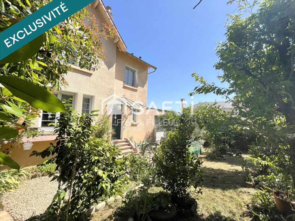 Maison de famille avec garage et jardin