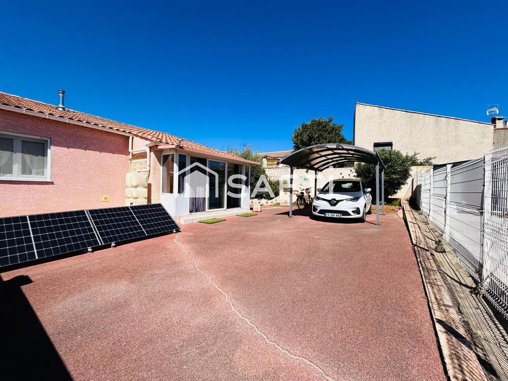 Maison plain-pied avec garage sur terrain de 380m2