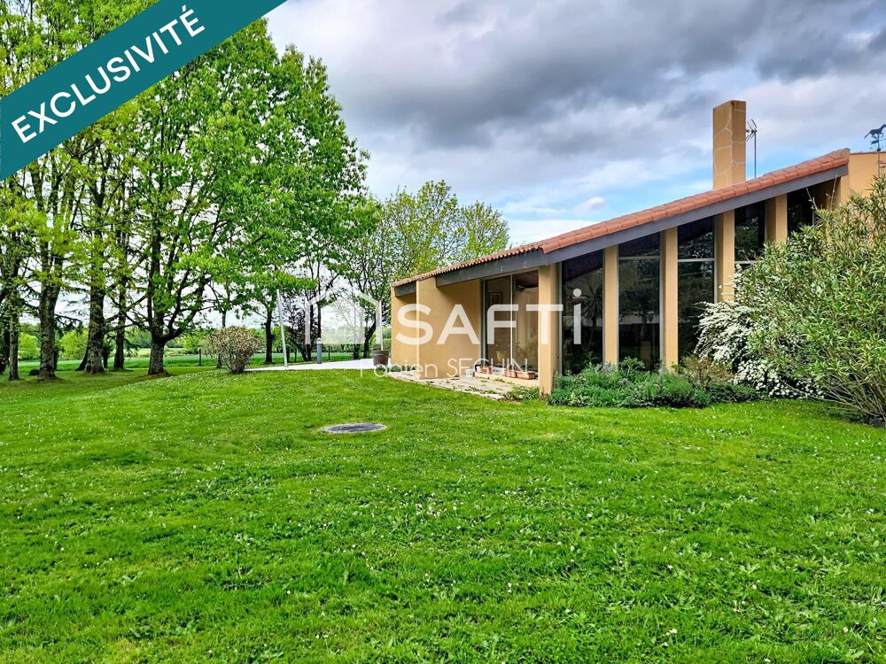 Maison d'architecte de 228 m2 édifiée sur une propriété arborée de 5384 m2 constructible au PLUI