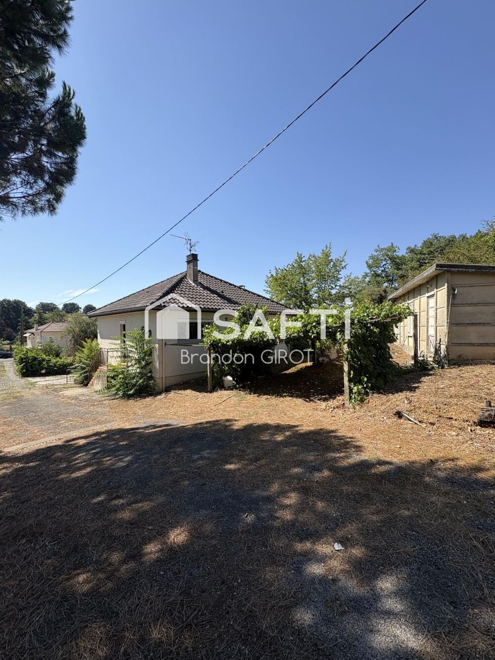 Maison avec beaucoup de terrain