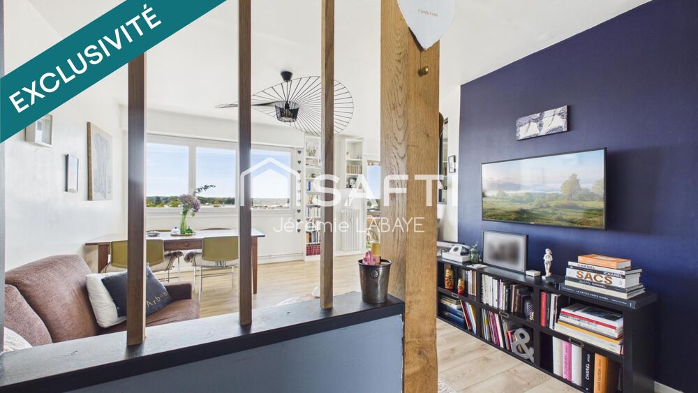 Bel appartement rénové avec balcon, cave et garage