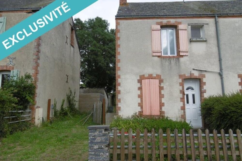 Jolie maison avec un terrain attenant.