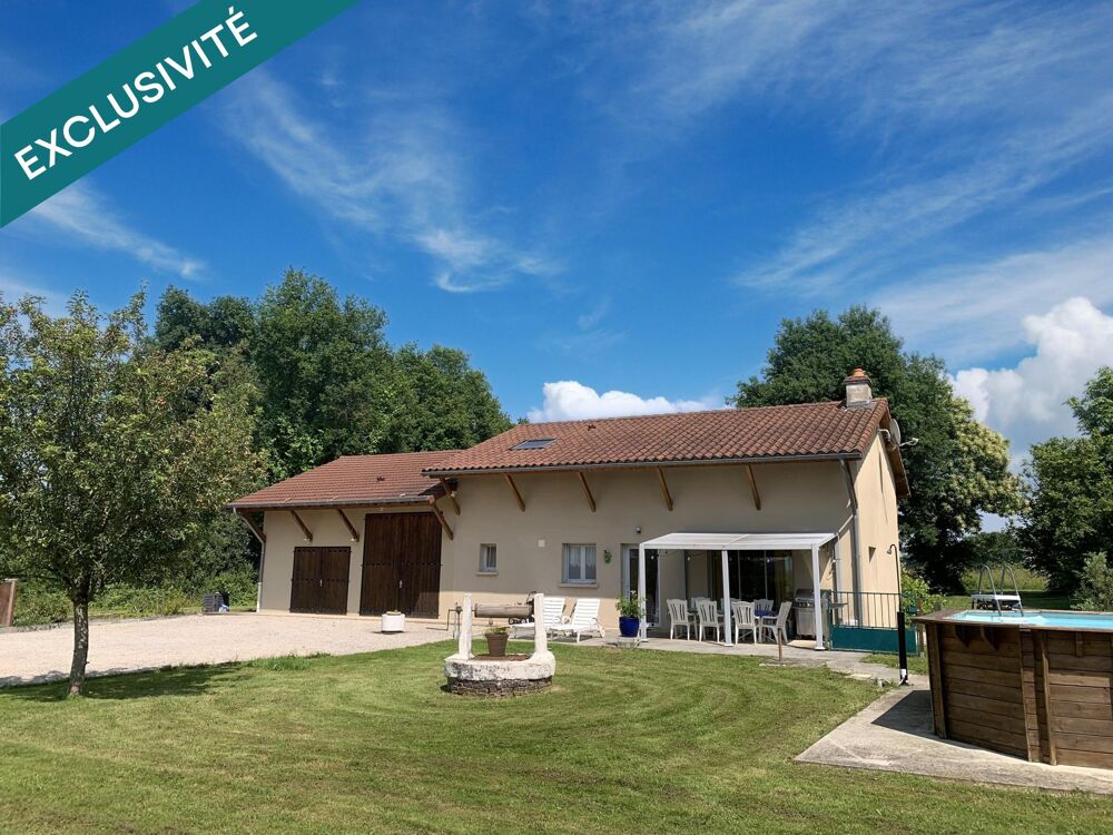 Jolie maison avec grand garage au calme