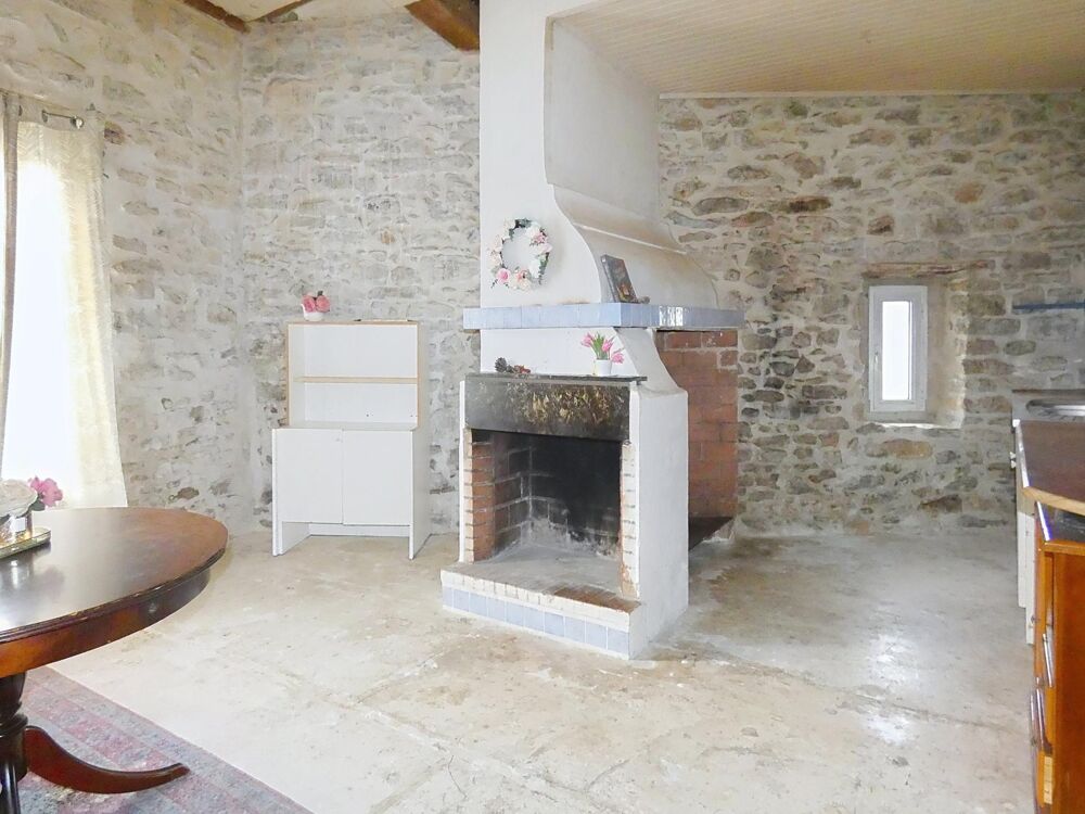 Maison en pierre avec garage, courette et jardin détaché