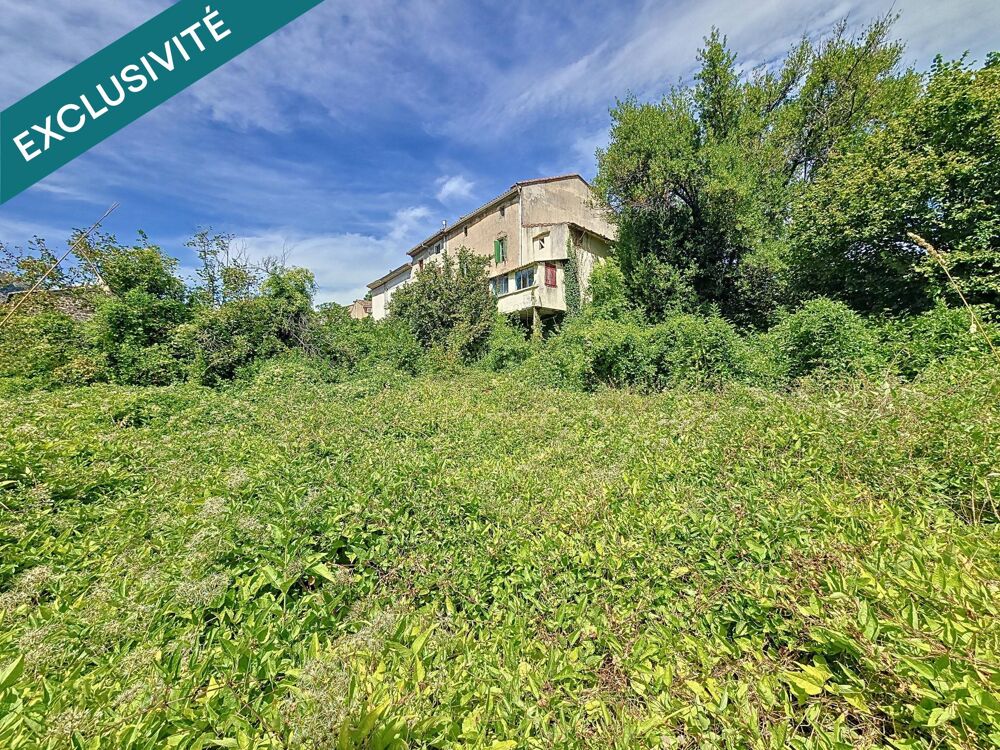 Maison R+1 avec grand terrain, garage, caves et accès rivière  Fort potentiel