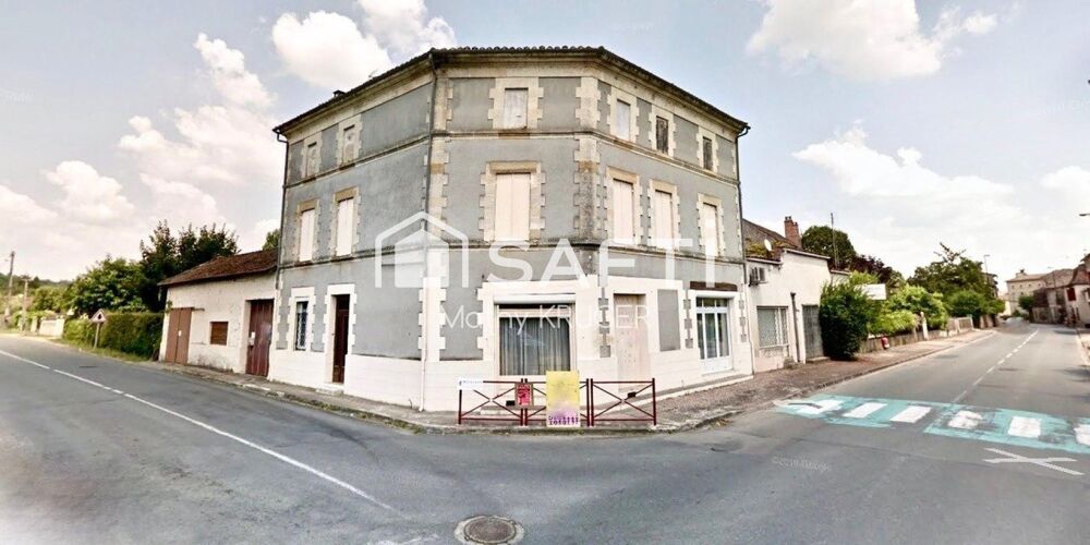 Bâtisse de caractère au coeur du village
