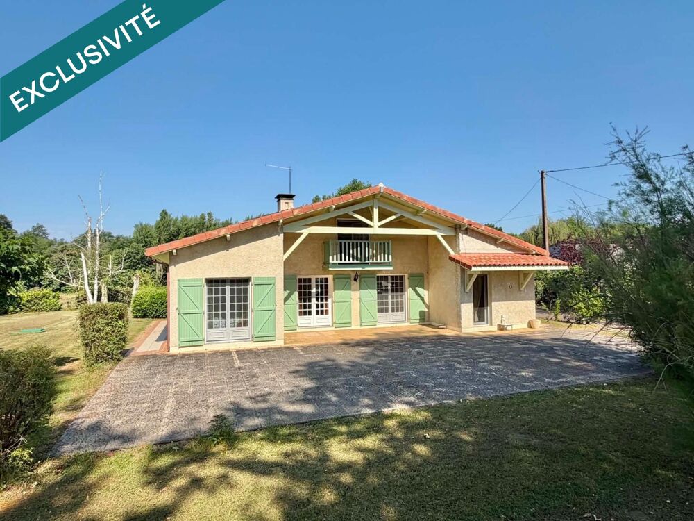 MAISON PLAIN PIED AVEC GRAND GARAGE ET TERRAIN CLOS
