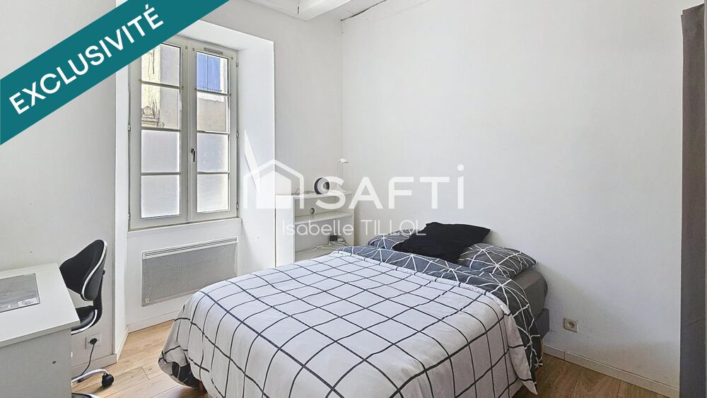 Appartement T2 immeuble de caractère