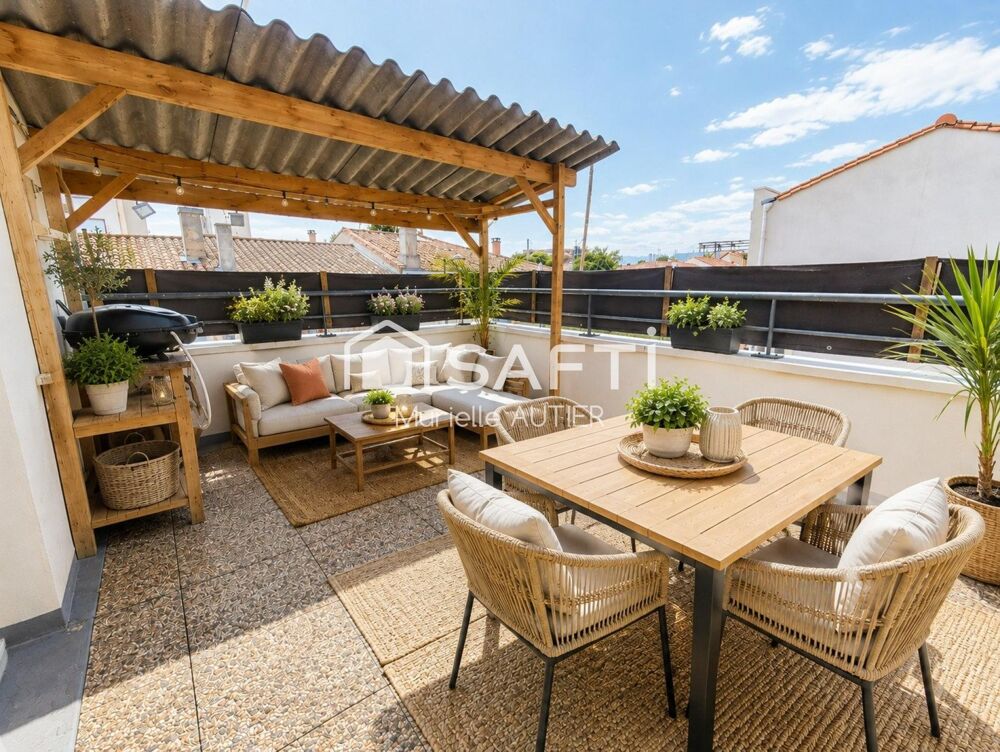 Maison de ville avec garage et terrasse