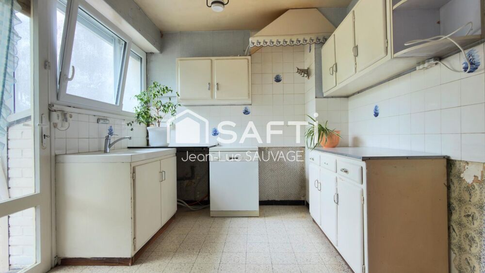 Maison 1950 à rénover avec garage et jardin
