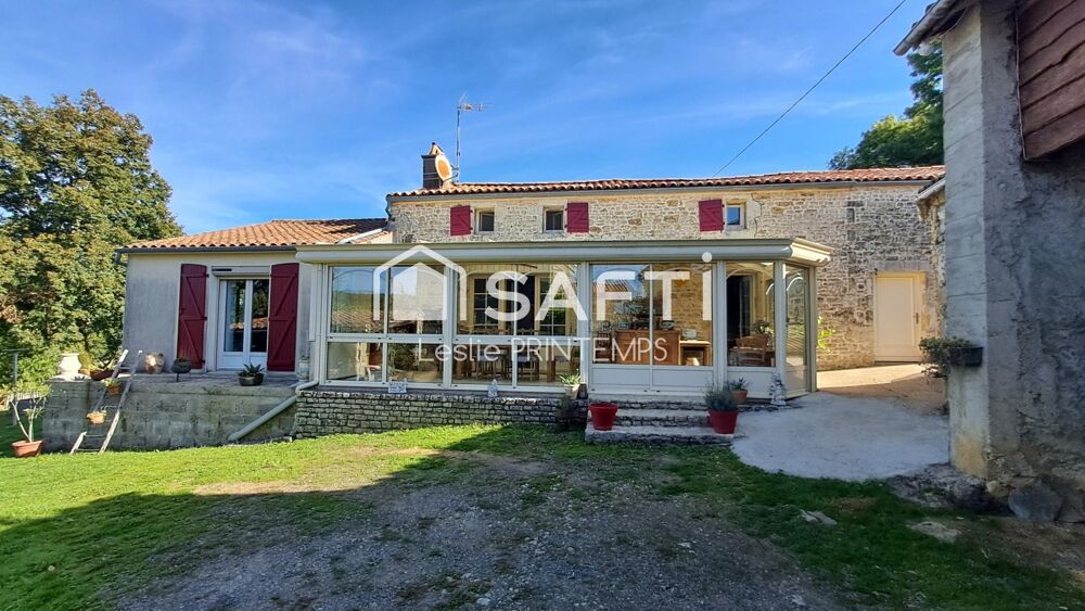 Maison spacieuse avec dépendances et jardin arboré