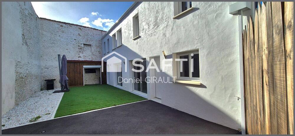 Vente Maison Située à Saujon, cette maison bénéficie d'un emplacement central et pratique, offrant un cadre de vie agréable à proximité des c Saujon