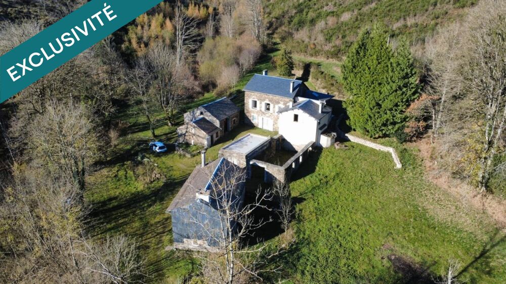 Maison avec dépendances sur terrain de 3,2 ha