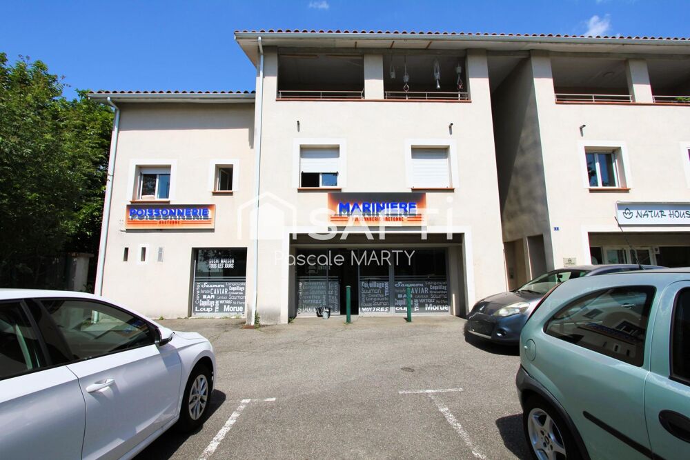   Centre de Bruguières local et 11 parkings en usage 