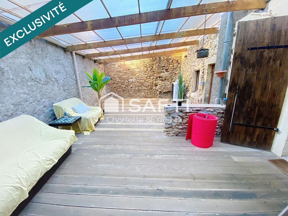 Maison atypique de 160m2 avec patio, double garage et jardin de 360m2