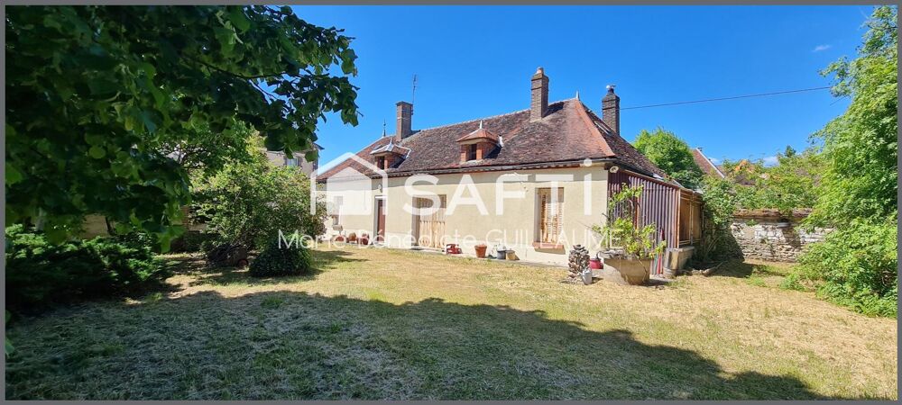 Maison ancienne et ses nombreuses dépendances