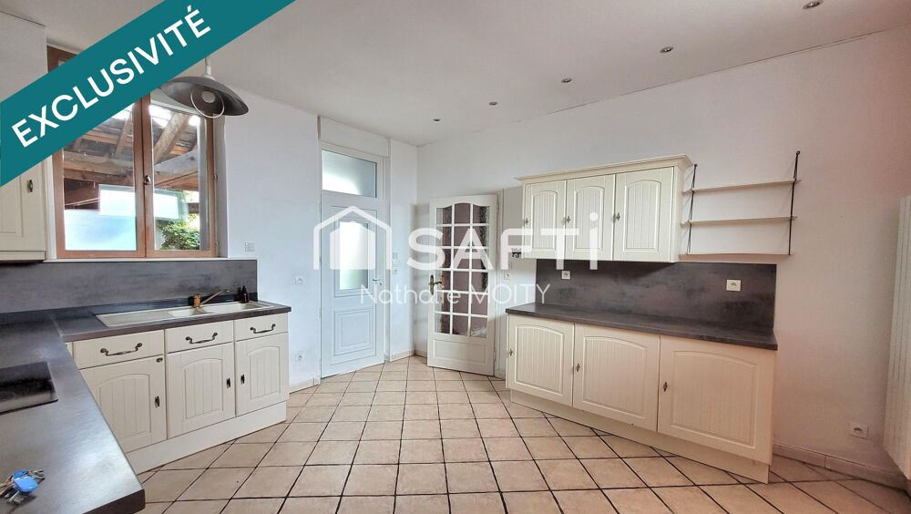 MAISON T6 de 143m² en CENTRE VILLE avec commodités de plain-pied, grande terrasse et accès véhicule