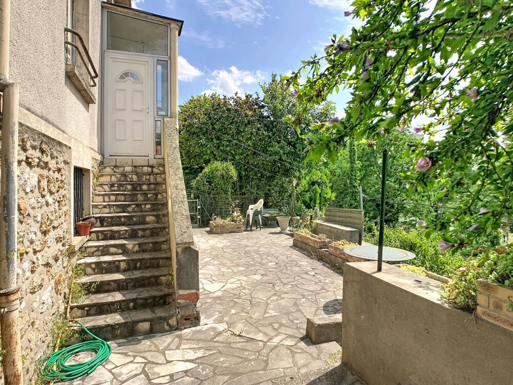 Maison sur sous sol avec jardin