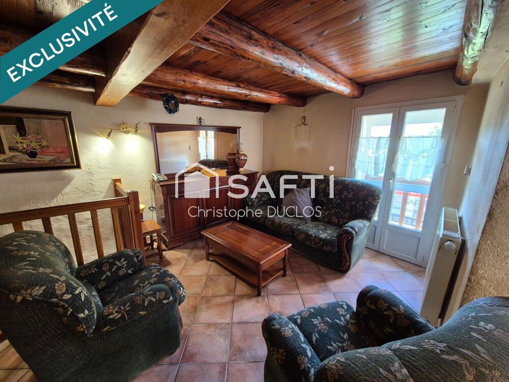 Maison de village avec terrasse et cave.