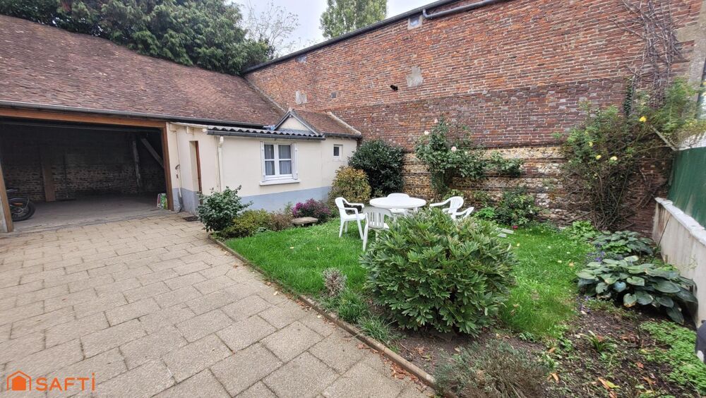 Vente Maison Maison de ville d'environ 100 m2 sur un terrain de 216 m2 avec garage et dépendance. L' aigle