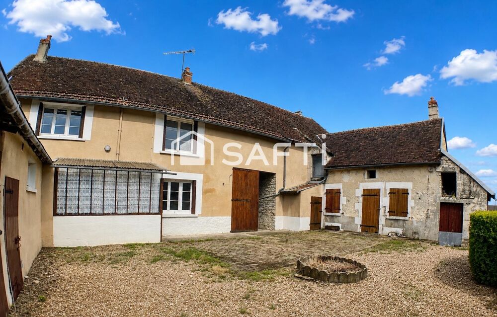 Maison 6 pièces avec trois garages et une dépendance aménageable